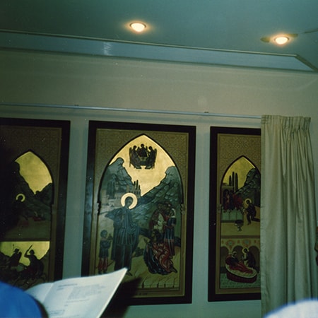 Framed artwork hanging on wall inside Chapel