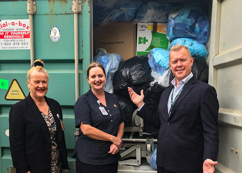 The shipping container full of beds and medical supplies ready for Tonga with Maureen Waddington, Carolyn Mornane, Alex Demidov of St John of God Ballarat Hospital.