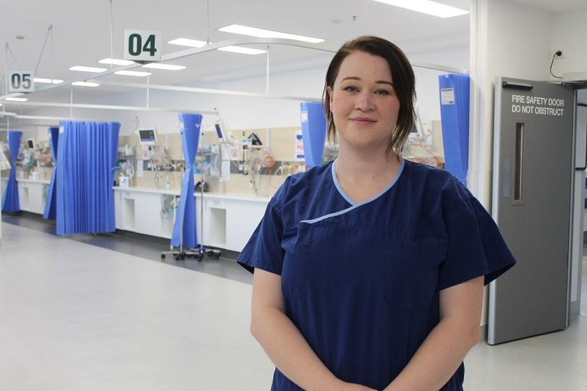 Simone Dobson standing in St John of God Geelong Hospital ward