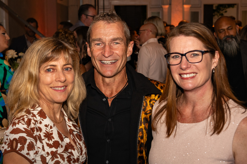Three people standing smiling at the camera including Dr Greg Hogan (centre) and St John of God Mt Lawley Hospital CEO Vanessa Unwin (right).