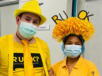 Caregivers glowing yellow for R U OK Day