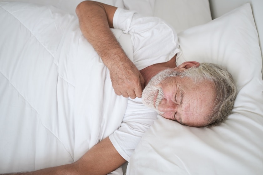 Man sleeping in bed