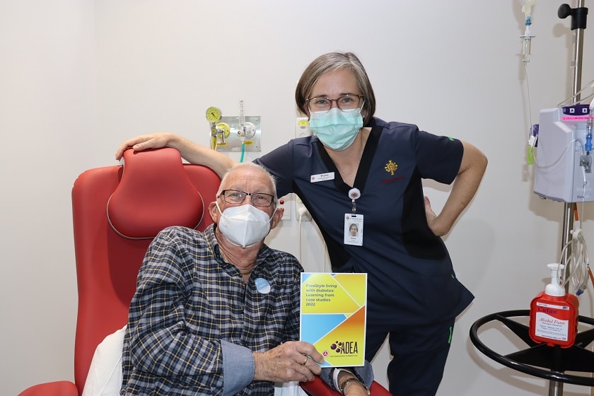 Diabetes Educator at St John of God Murdoch Hospital stands proudly with patient Ron who is the topic of her case study which won a National Award in 2022. 