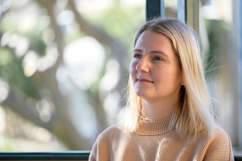 Image of blonde woman looking pensive