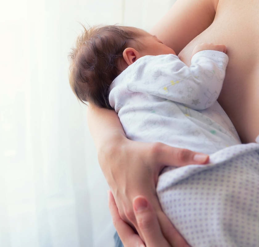 Mum breastfeeding infant