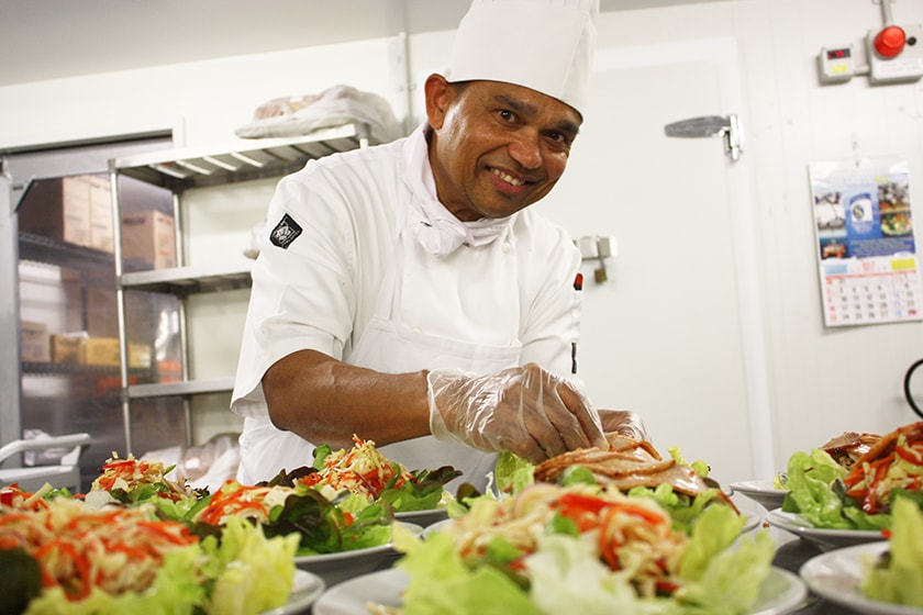 Chef Sarath Weerakoon preparing fresh salads