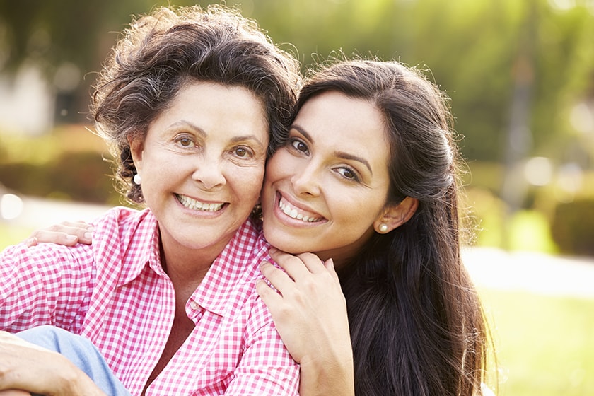 Woman with her mother smiling