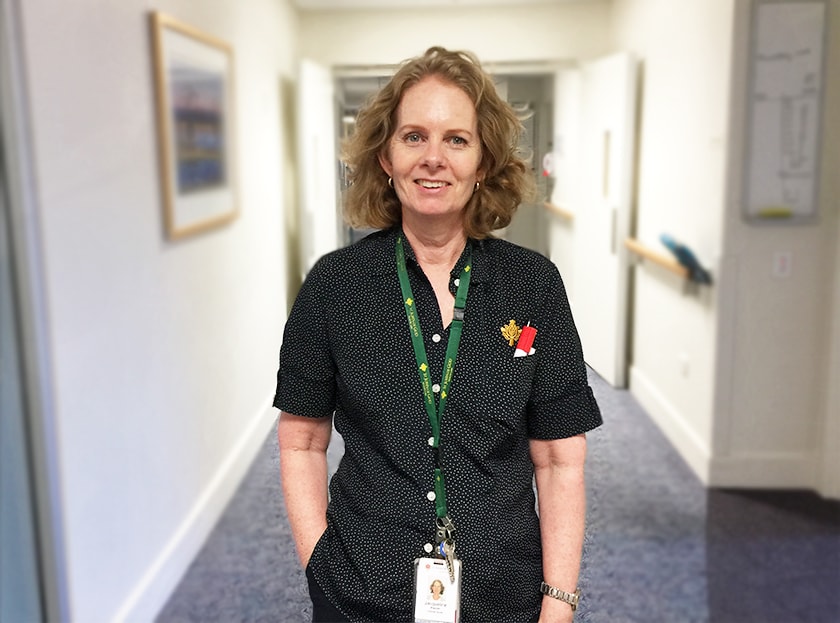 Clinical Nurse Palliative Care Jacqueline Mazzer standing in corridor