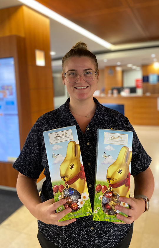 Caregiver with Lindt chocolate bunnies