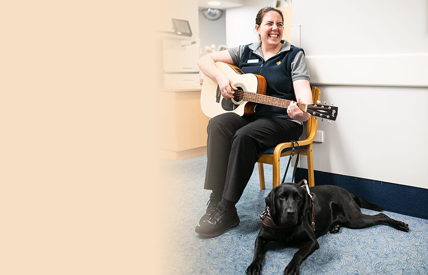 Caregiver musician and therapy dog