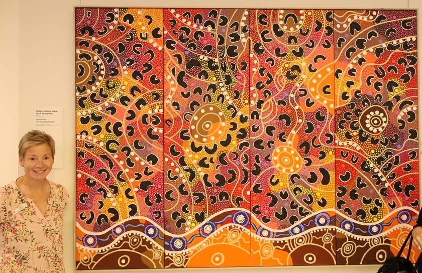 Rn Tracey Gracewood with art piece 