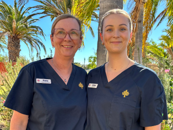 mother and daughter stood beside each other as a health care duo