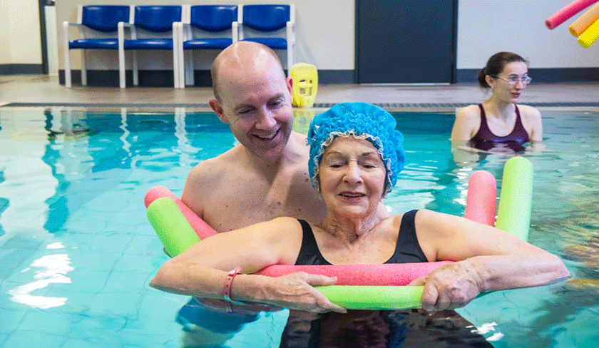 Patient in pool doing hydrotherapy
