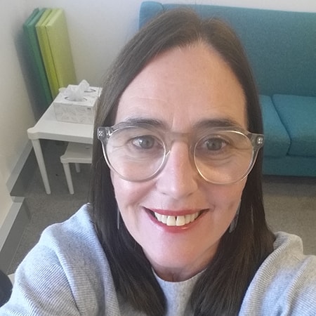 Head shot of Eilish Burns, smiling at the camera.