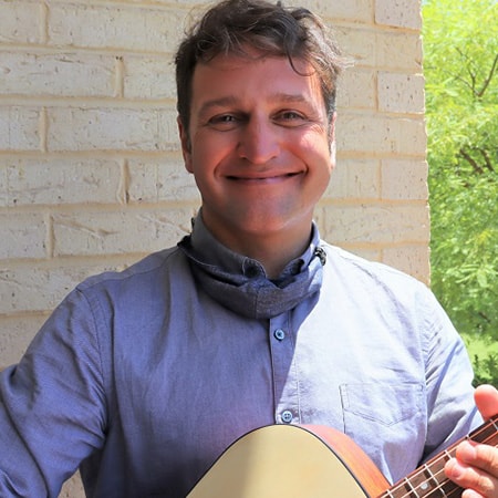 St John of God Murdoch Hospital Registered Music Therapist Giuseppe Reina with his guitar 