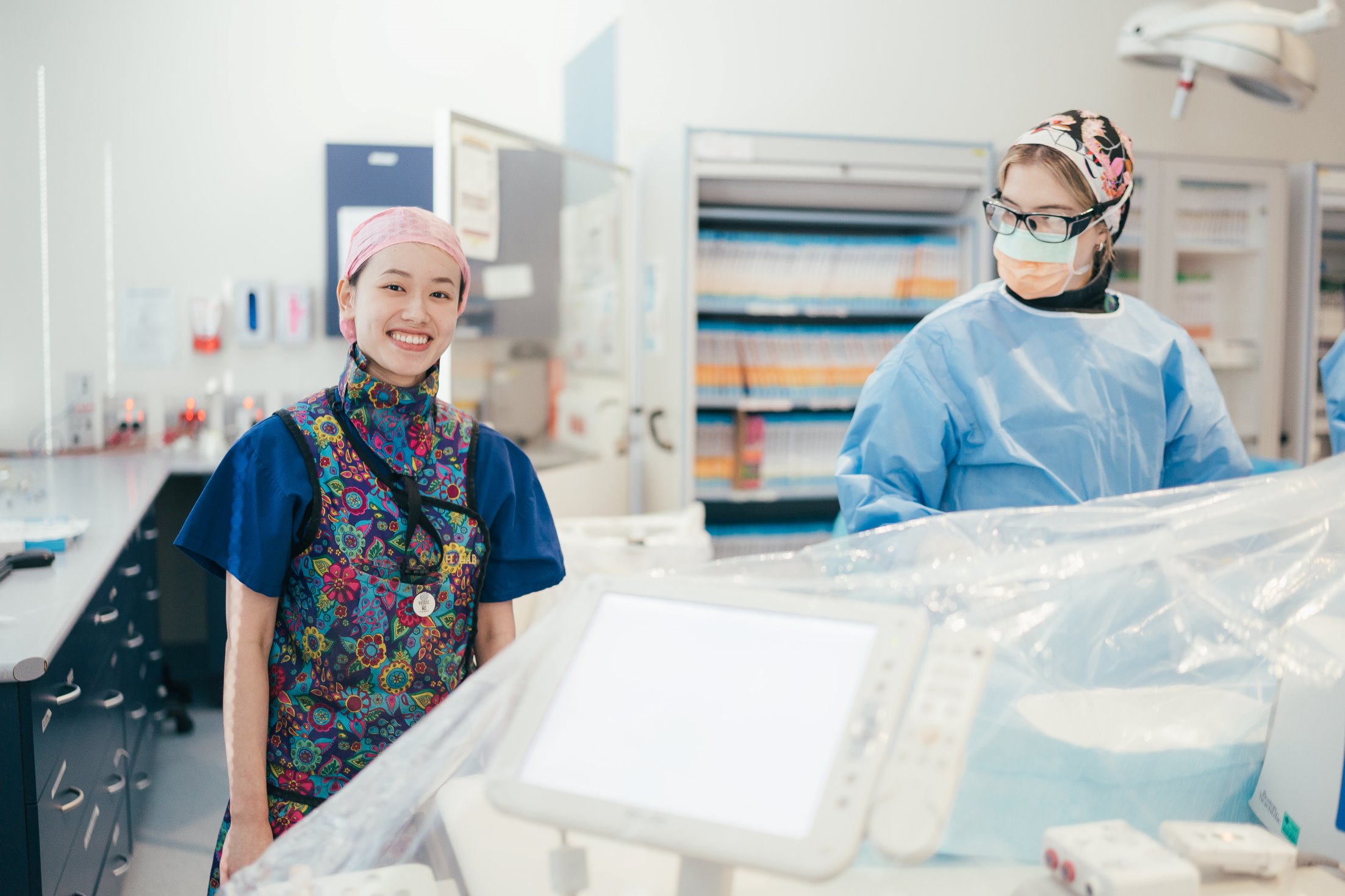 A caregiver comforts a breast cancer patient 