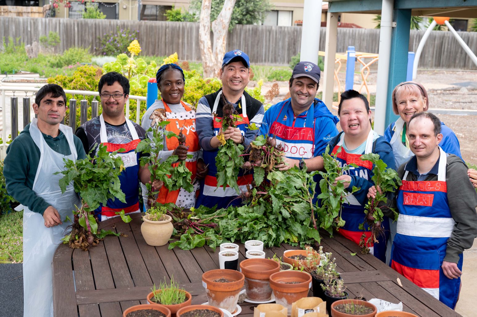Group of clients taking part in a gardening activity
