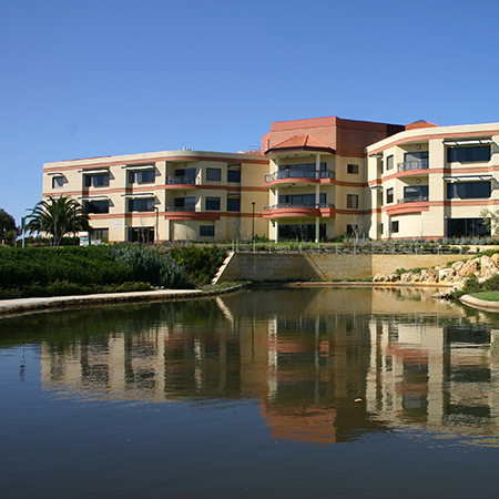 view of hospital by lake