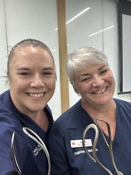 Two caregiver educators, Lesley and Janet, smiling at the camera.