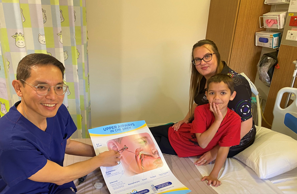 ENT surgeon with patient 