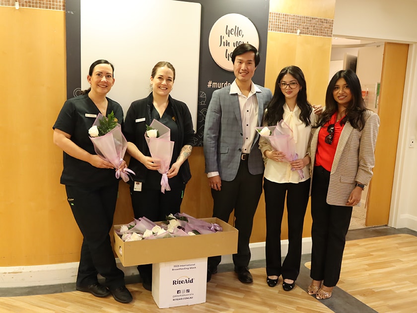 St John of God Murdoch Hospital caregivers with Rite Aid employees and some Rite Aid care packages.