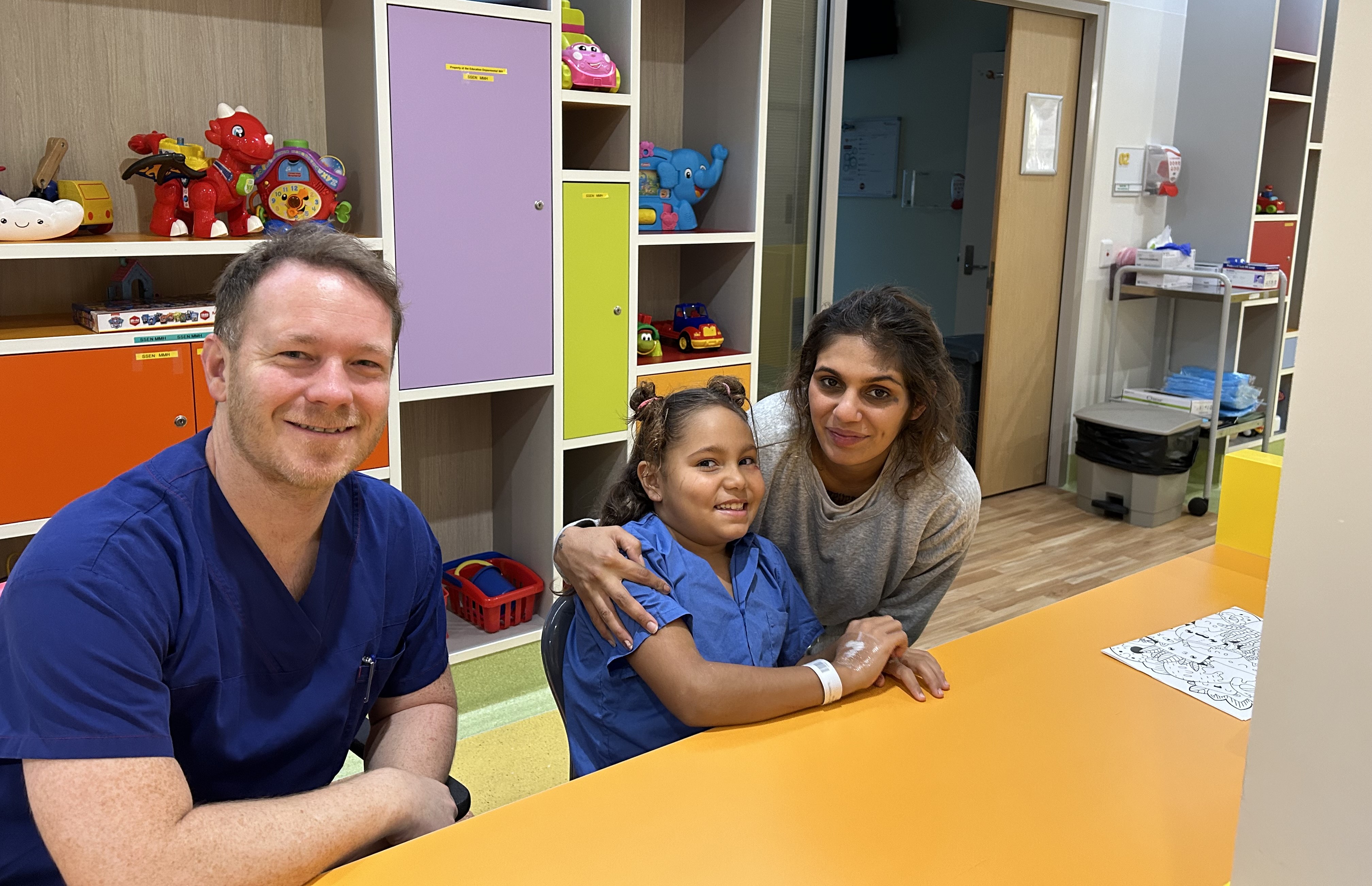 ENT Surgeon with young patient