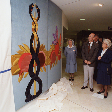 caregiver looking at artwork