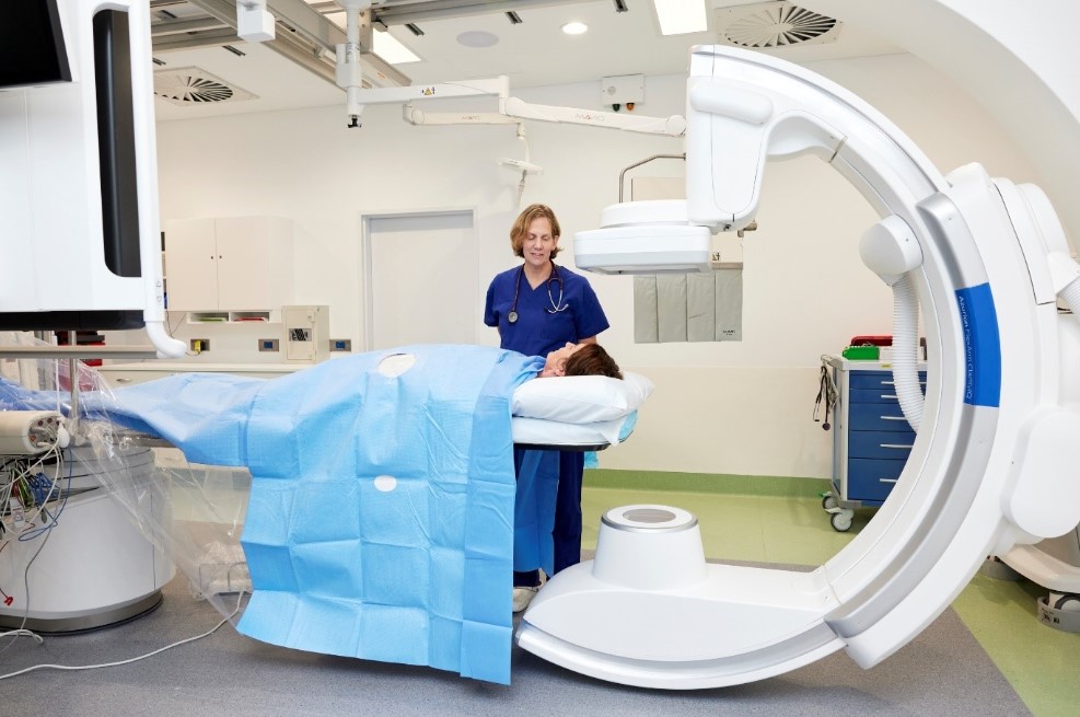 A caregiver looking at cancer patient 