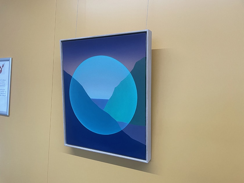 A photo of the artwork Dapeng Liu, Landscape of the Future, hanging on the wall.