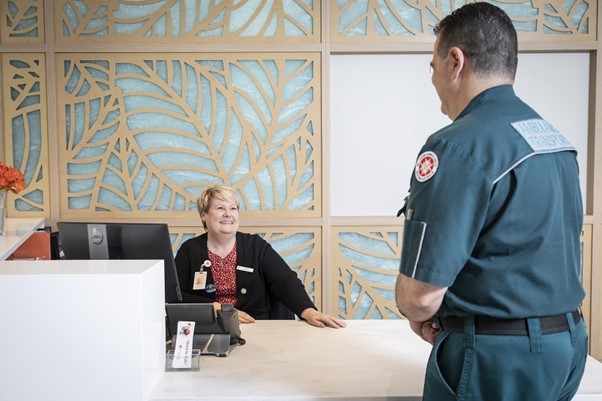 Nurse and ambulance at entrance