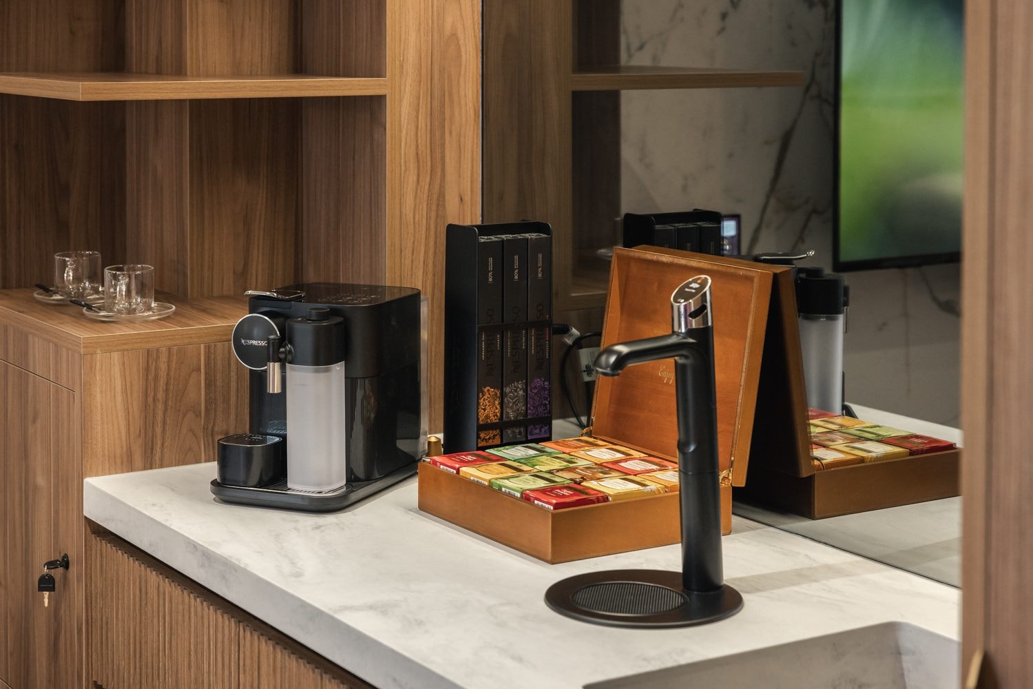 The coffee machine and tea bags available in The Suites