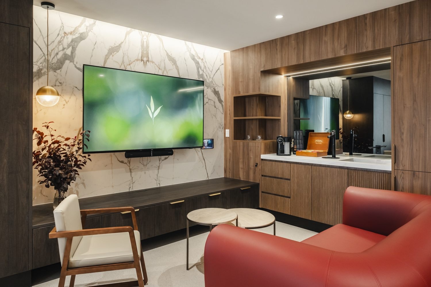 The TV and sofa in The Suites