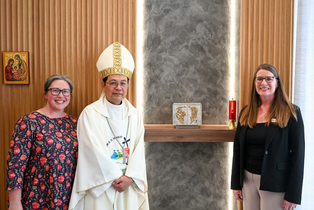 St John of God Midland Private Hospital Director Mission Integration Karlee Guest, Bishop Nelson Po and St John of God Midland Private Hospital CEO Vanessa Unwin standing with the restored tabernacle
