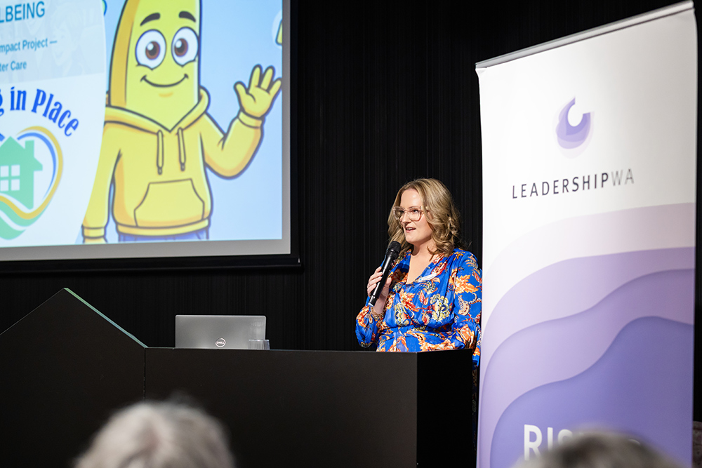 Emily Kenworthy addressing event attendees