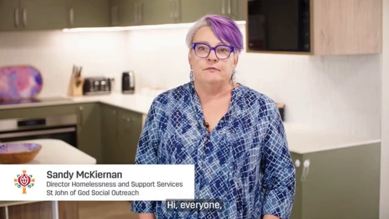 Sandy McKiernan, Director Homelessness and Support Services at St John of God Social Outreach, standing in a kitchen.