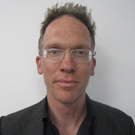 Portrait of Dr Aaron Walton