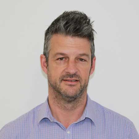 Portrait of Assoc Professor Andrew Hughes