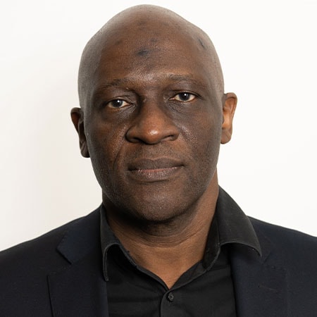 Portrait of Dr Andrew Kiberu