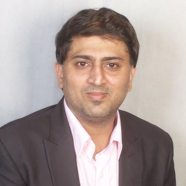 Portrait of Dr Gurvinder Kalra