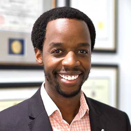 Portrait of Dr Andrew Kiyingi